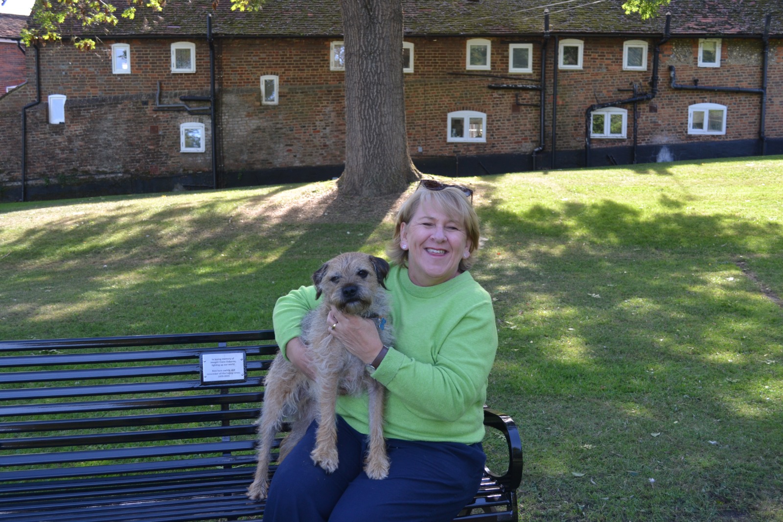 Caroline with Ted the terrier on her friend's bench